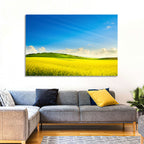 Rapeseed Field and Rolling Hills Under Blue Sky Wall Art