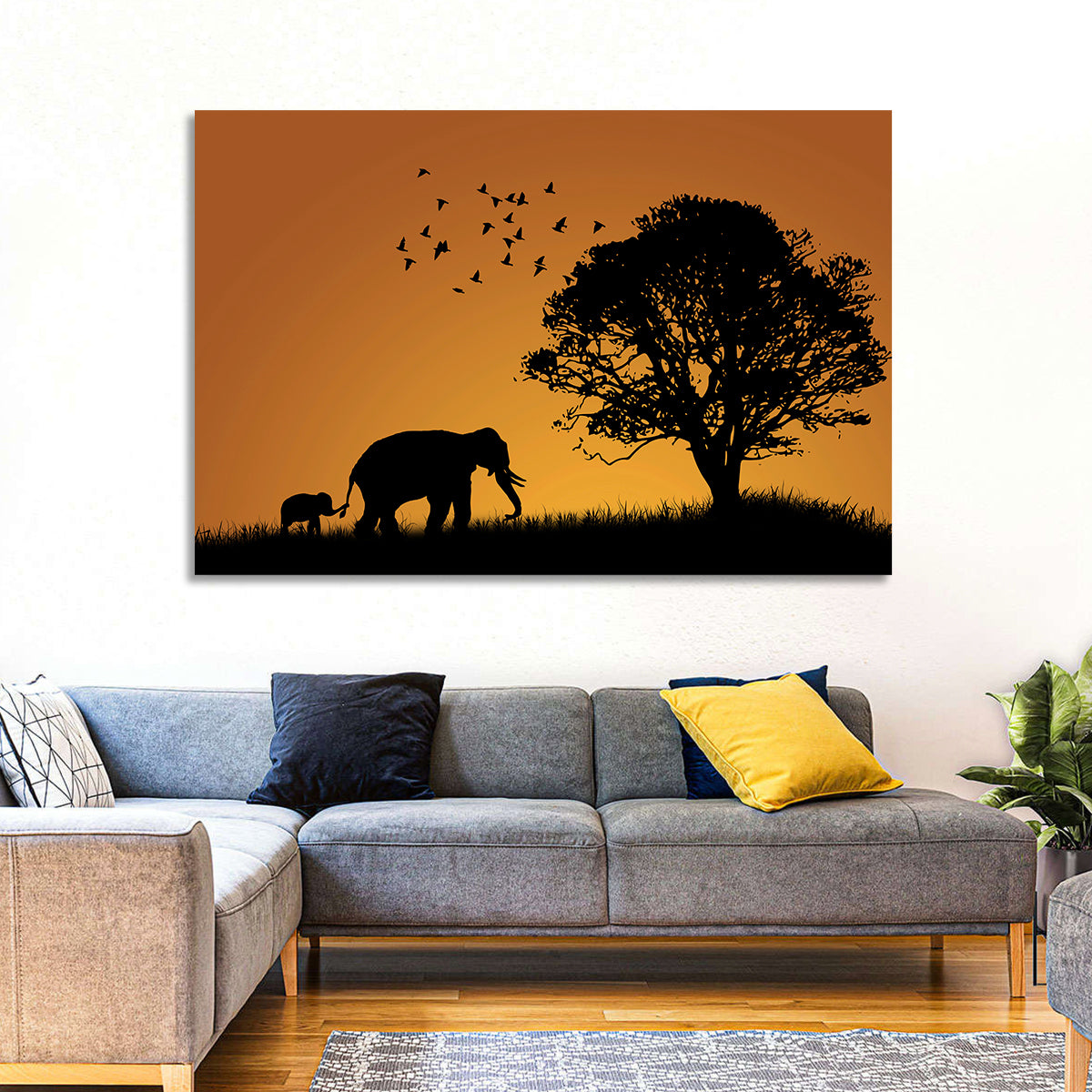 Elephant Family at Golden Sunset Wall Art in a room, landscape