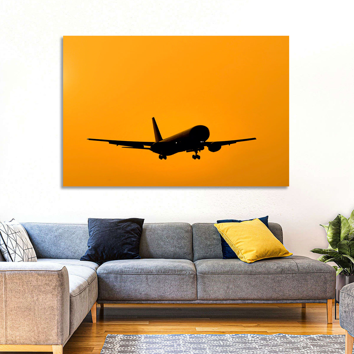Golden Hour Airliner Silhouette Wall Art in a room, landscape