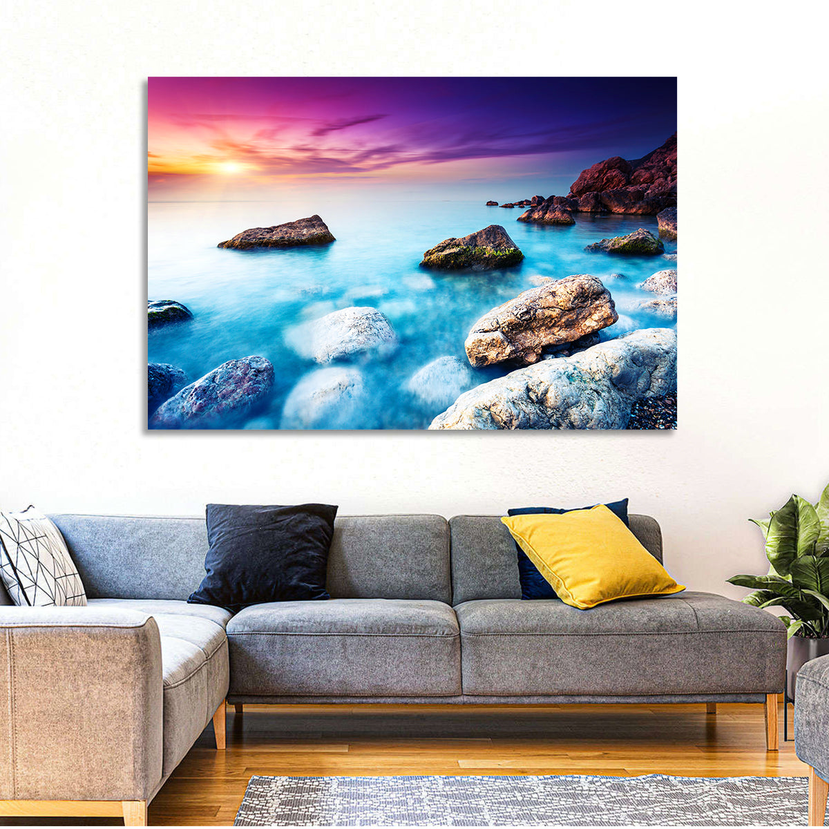 Rocky Beach Sunset Wall Art in a room, landscape