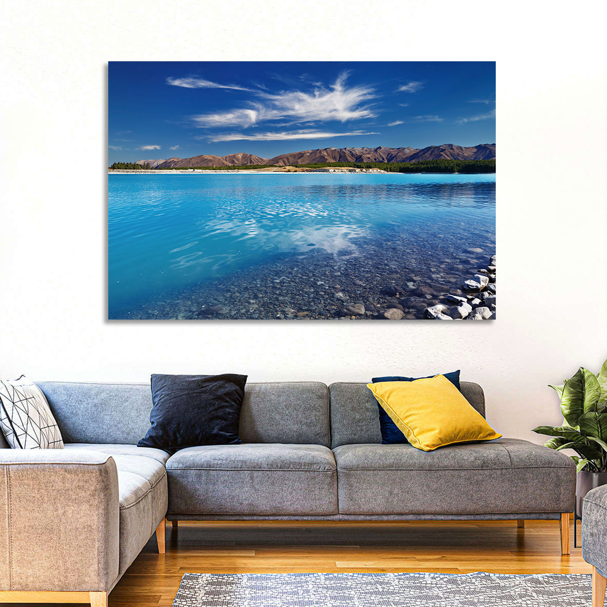Lake Pukaki Pebble Shore Wall Art in a room, landscape