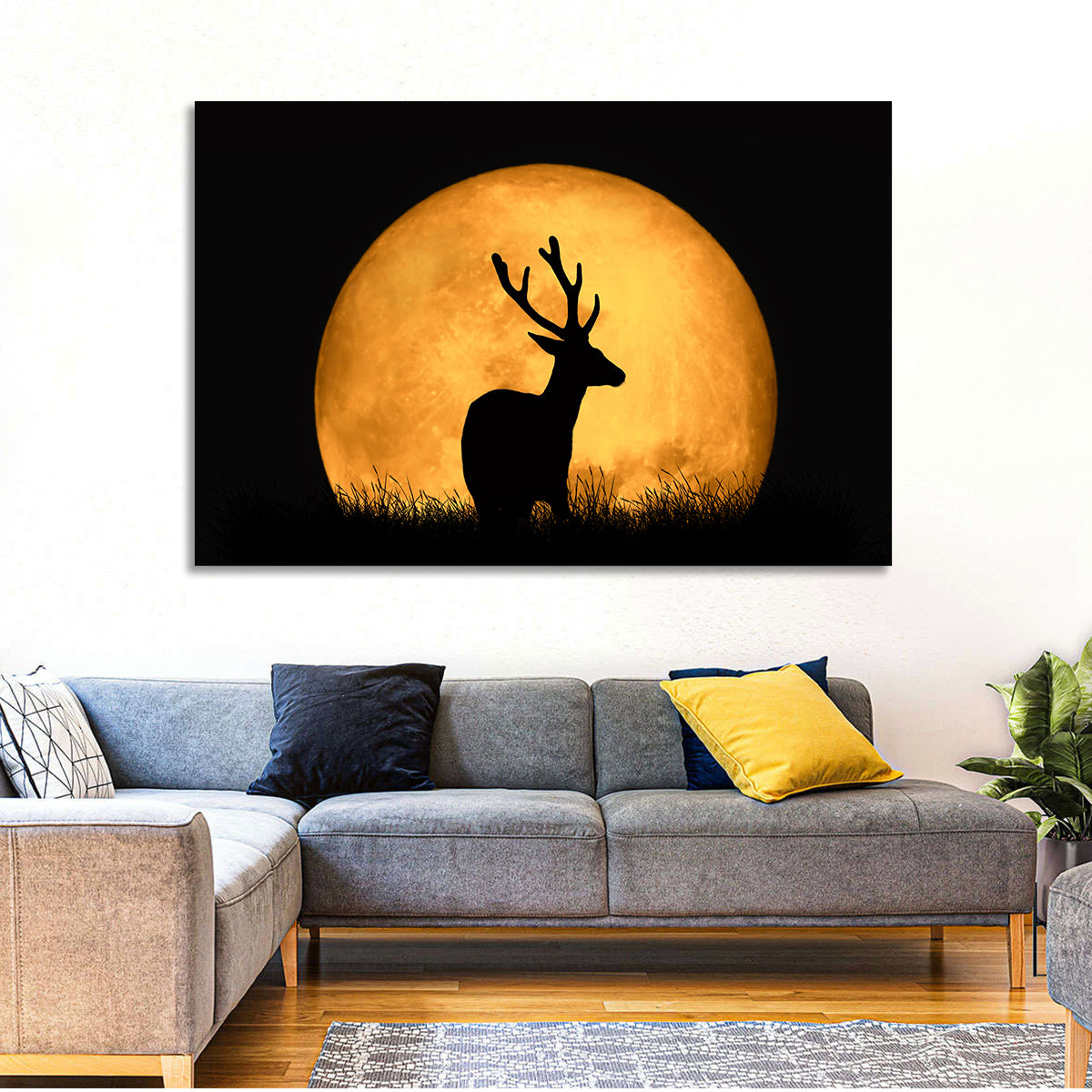 Buck Silhouette Under Red Moon Wall Art in a room, landscape