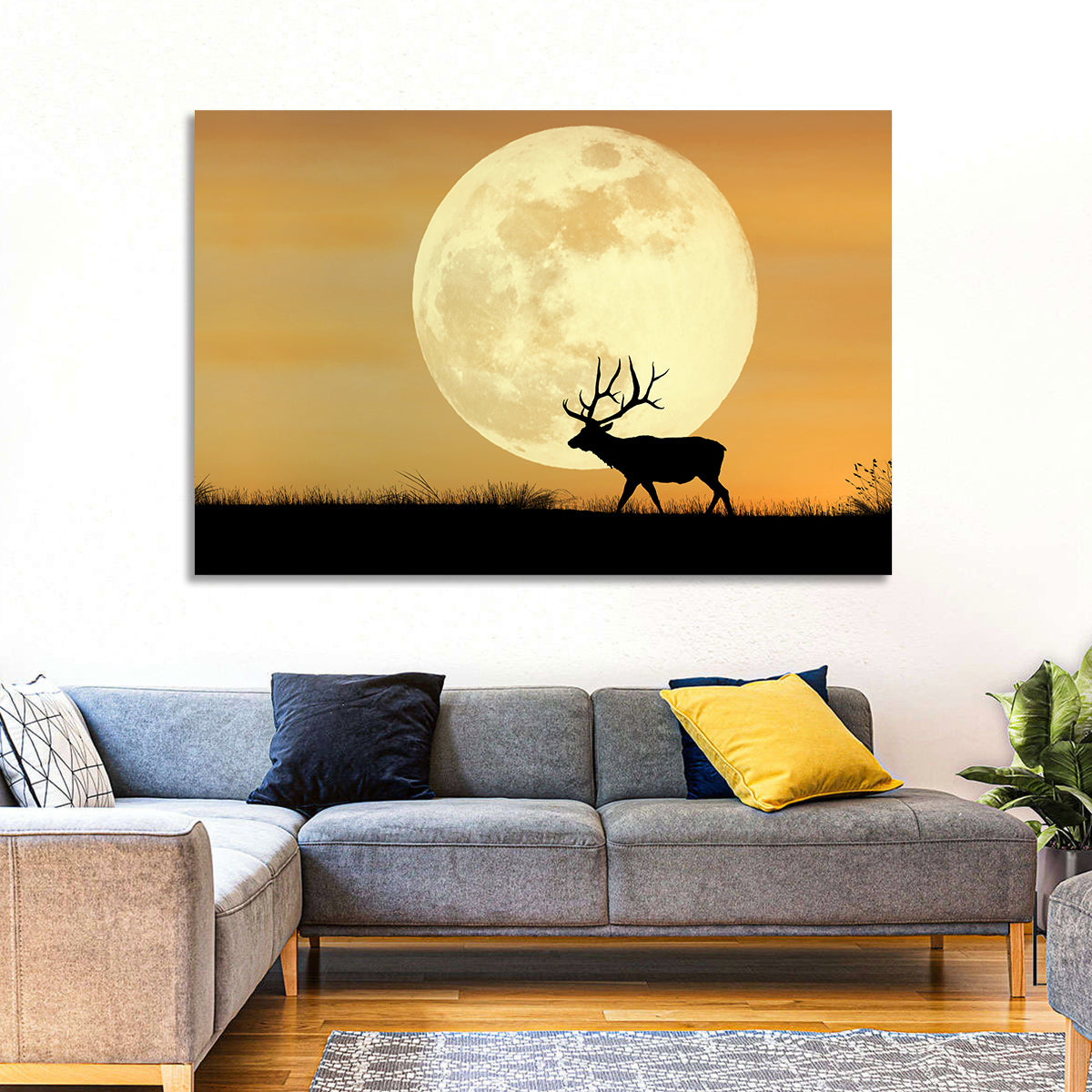 Bull Elk Silhouette Under Supermoon Wall Art in a room, landscape