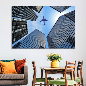 Airplane Above Skyscrapers Wall Art