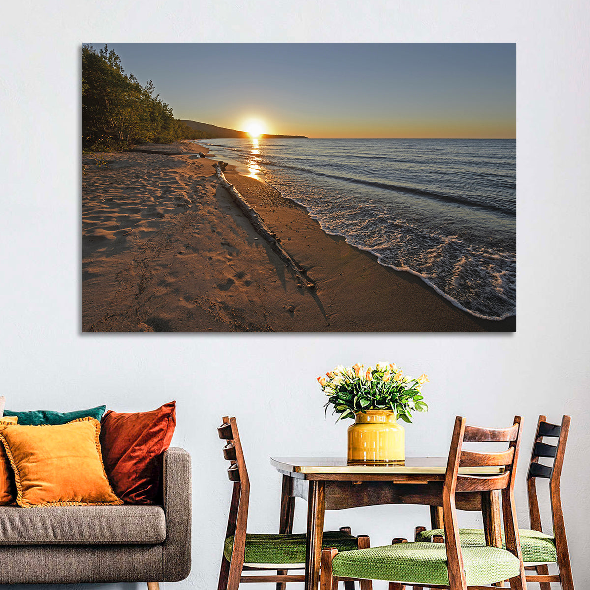 Lake Superior Driftwood Beach Sunset Wall Art in a room, landscape