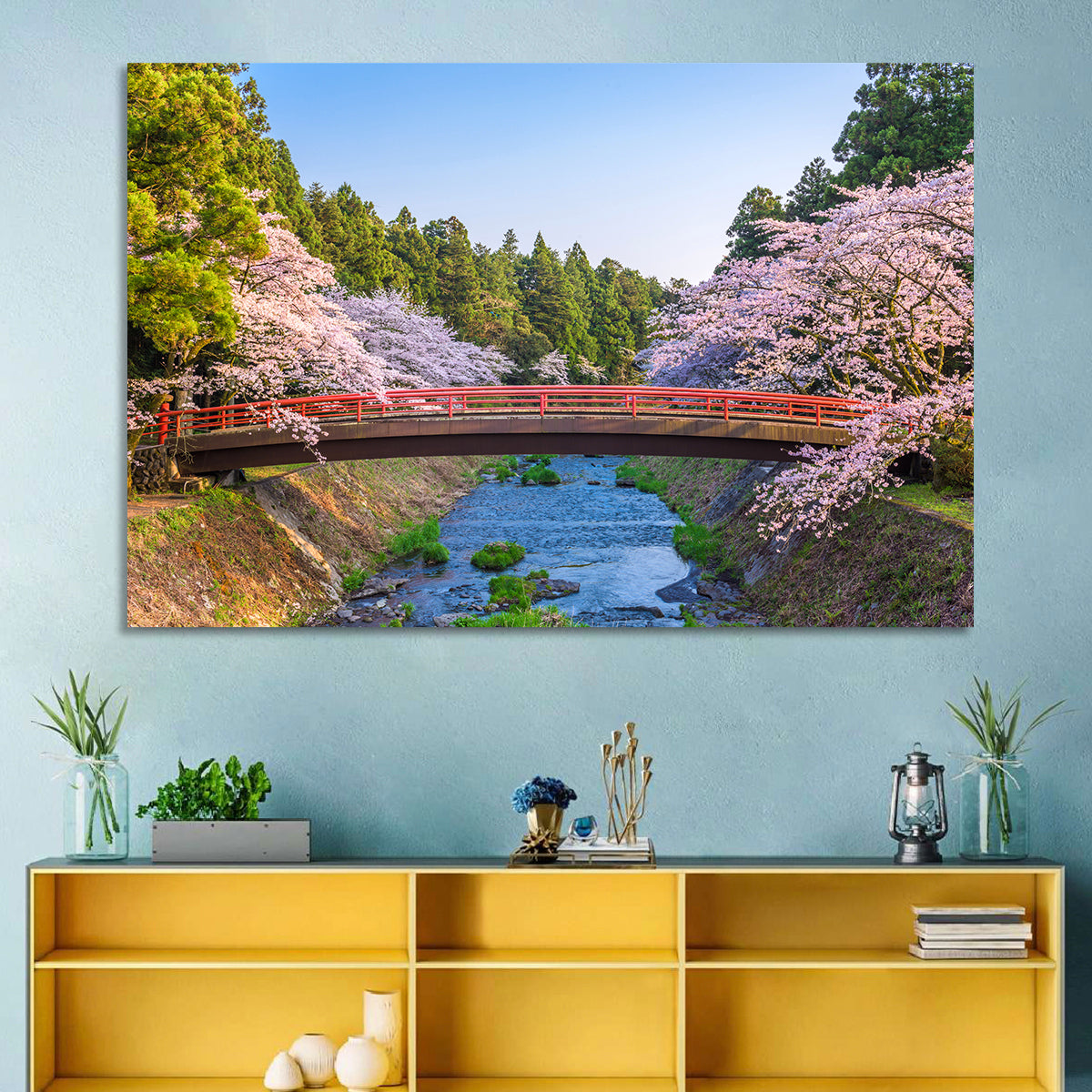 Arched Red Bridge with Cherry Blossoms Wall Art in a room, landscape