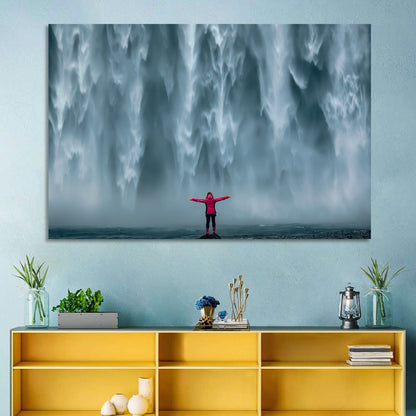 Skogafoss Waterfall with Figure in Pink Wall Art