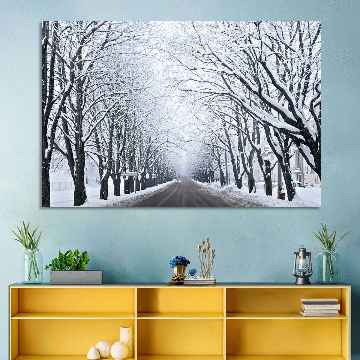 Snowy Road with Distant Headlights Wall Art in a room, landscape