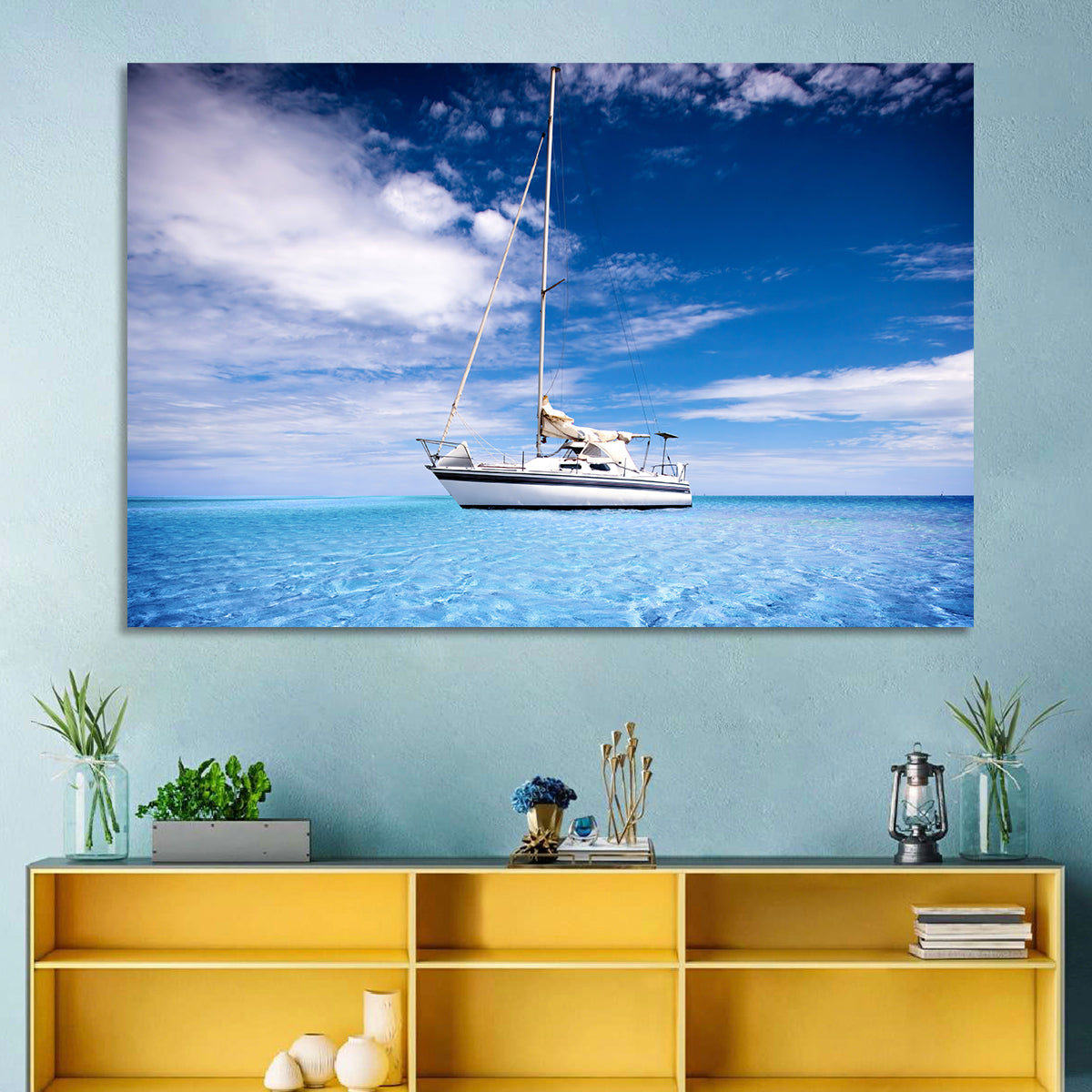 Furled Sails Over Turquoise Water Wall Art in a room, landscape