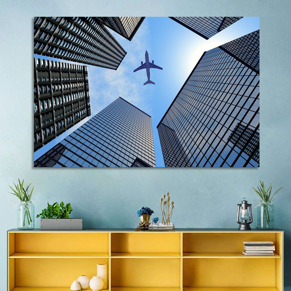 Airplane Above Skyscrapers Wall Art in a room, landscape