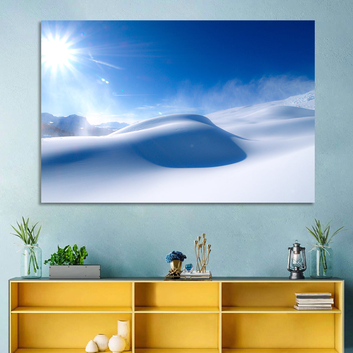Sunlit Snow Dune Under Blue Sky Wall Art in a room, landscape