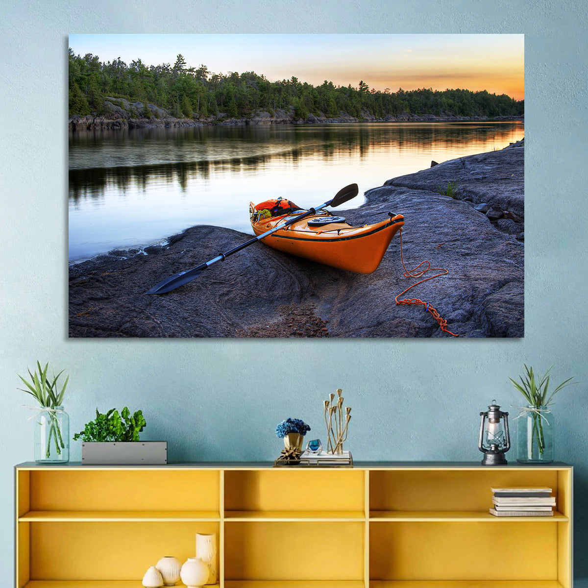 Orange Kayak on Rocky Shore Wall Art