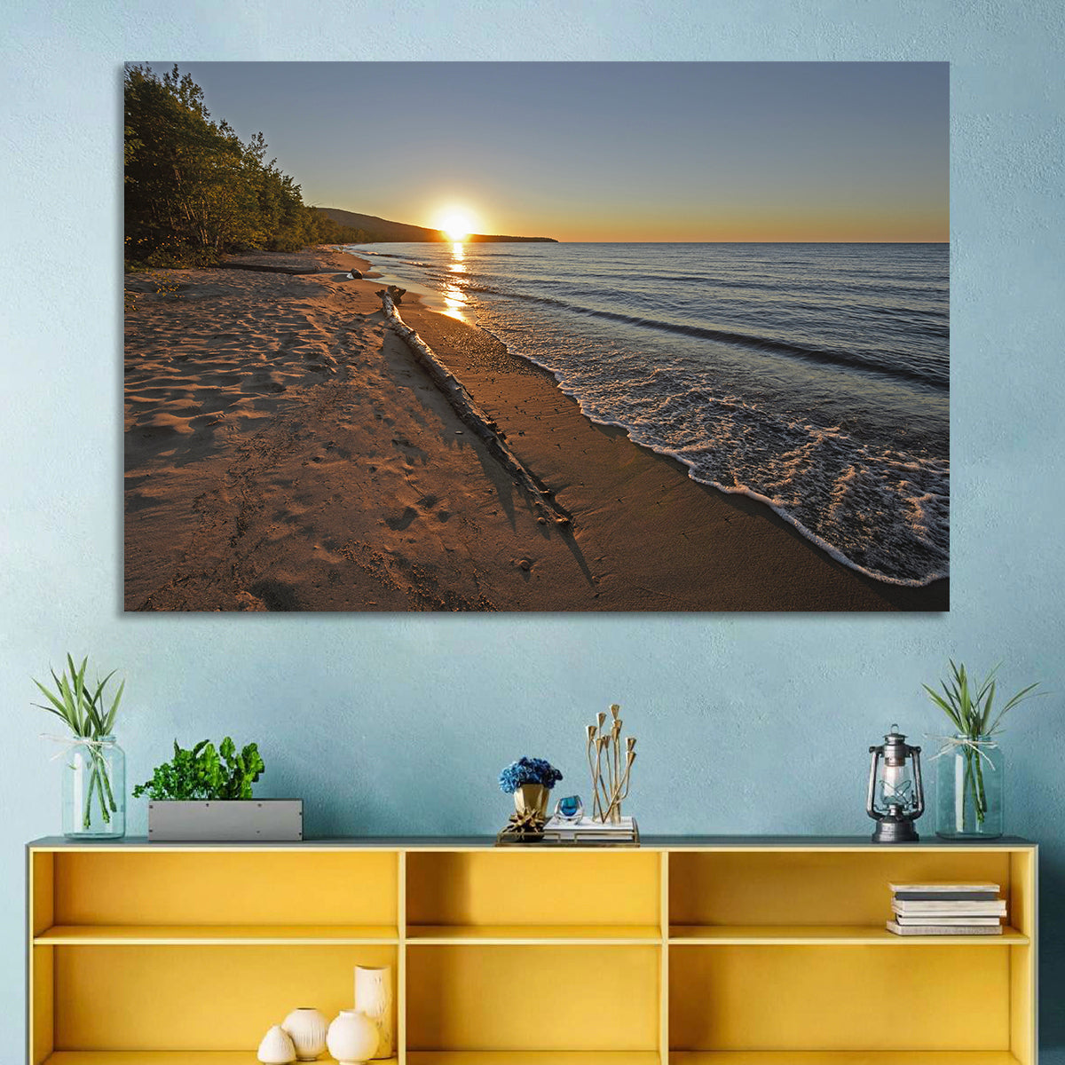 Lake Superior Driftwood Beach Sunset Wall Art in a room, landscape