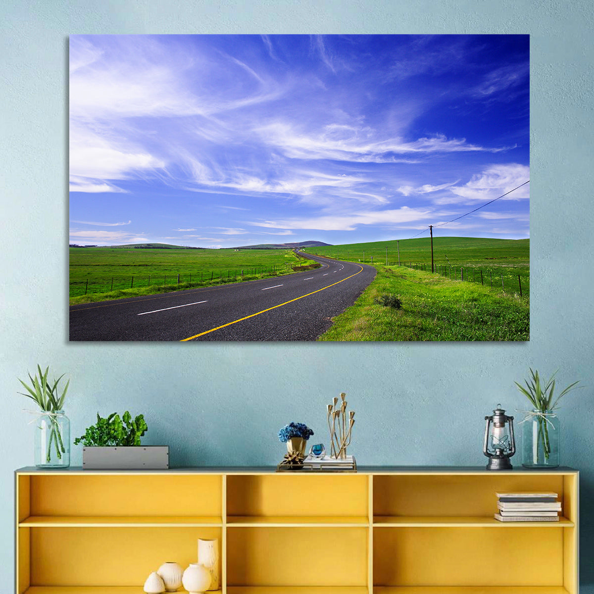 Winding Country Road in Green Fields Wall Art in a room, landscape