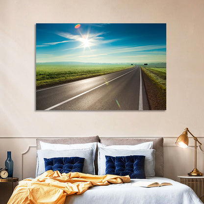 Sunlit Road Through Green Field Wall Art