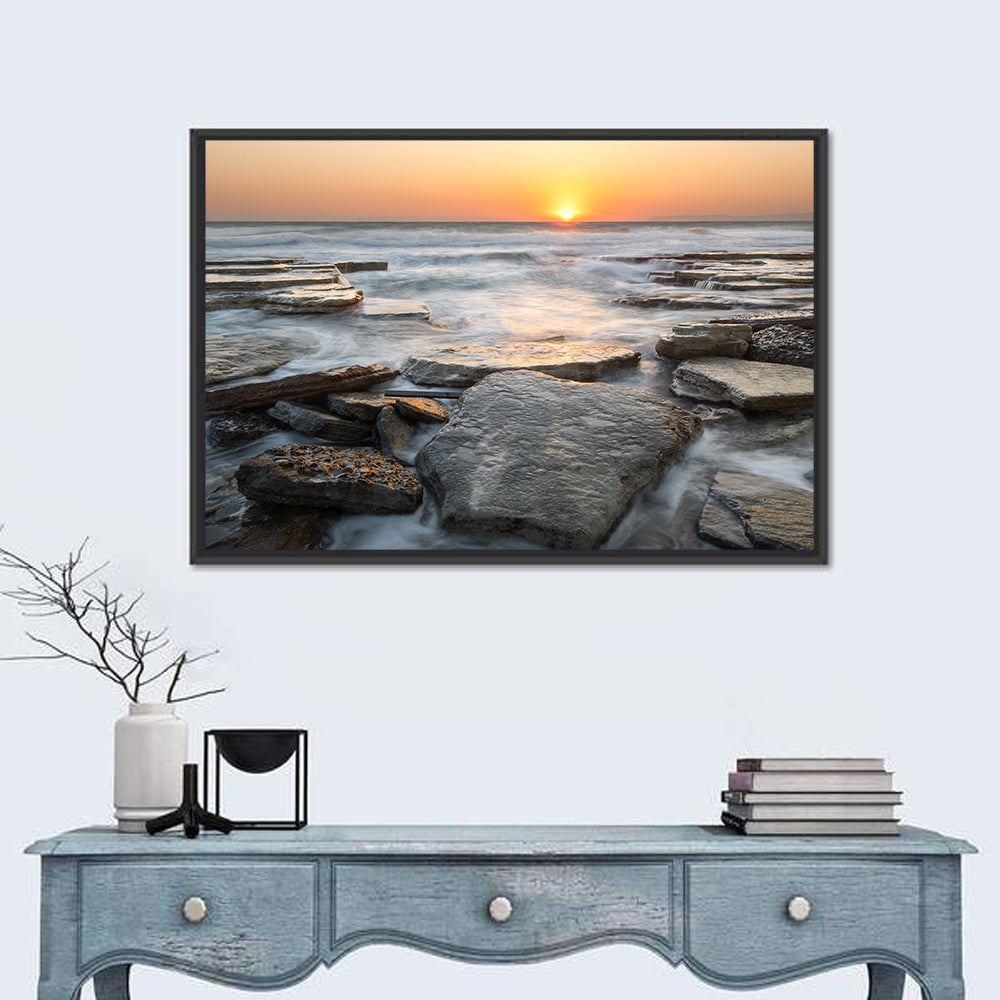 Golden Hour Rock Shoreline Sunset Wall Art in a room, landscape