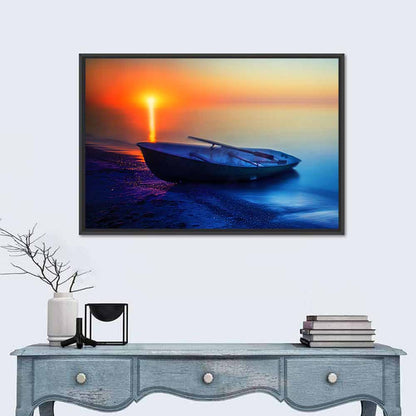 Rowboat on Sandy Shore at Sunset Wall Art