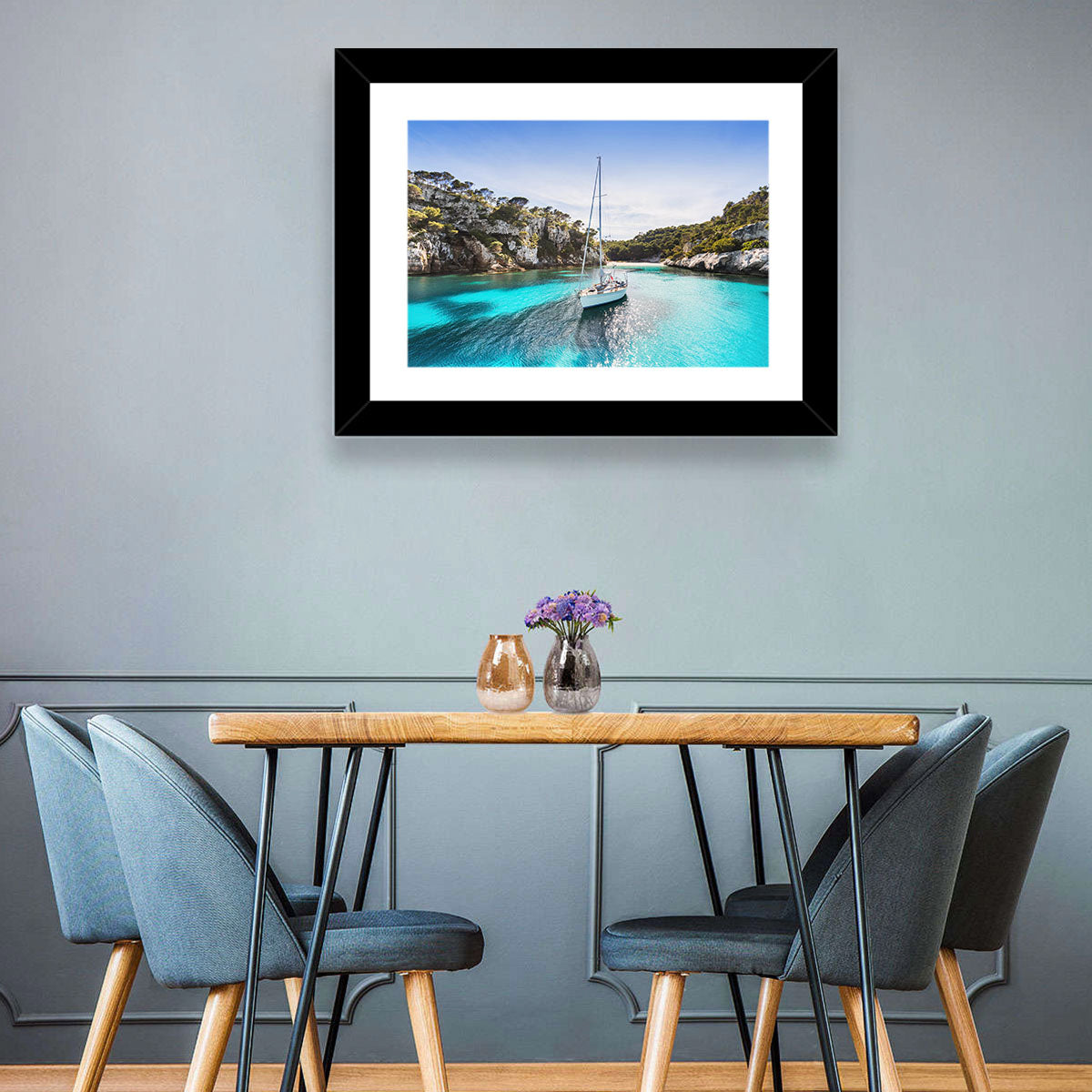 Menorca Cove Sailboat Wall Art in a room, landscape