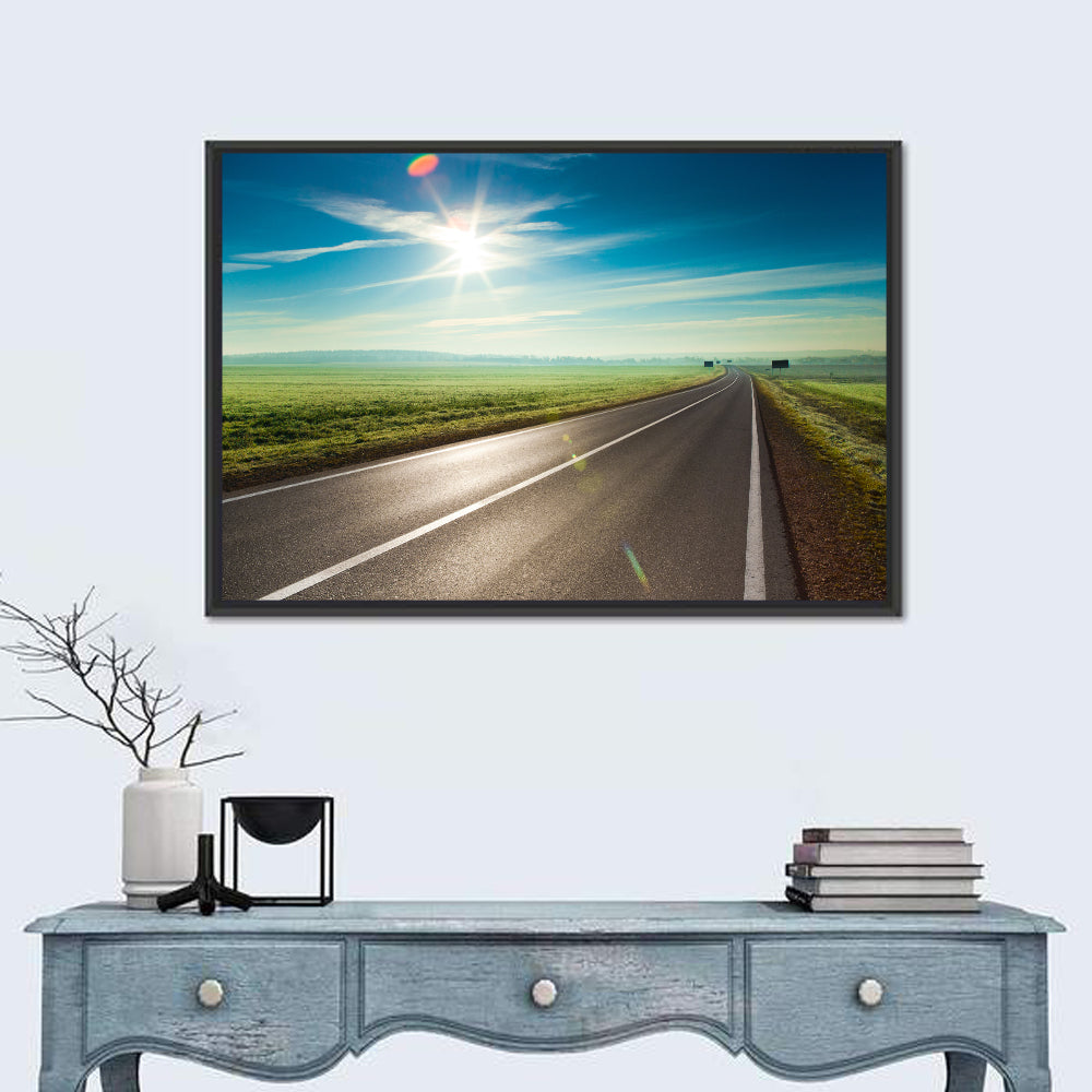 Sunlit Road Through Green Field Wall Art