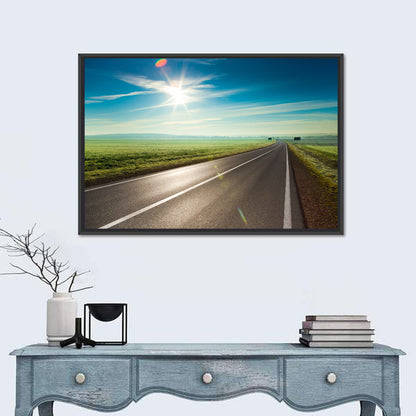 Sunlit Road Through Green Field Wall Art