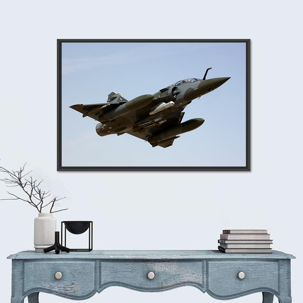 Camouflaged Fighter Jet in Flight Wall Art in a room, landscape