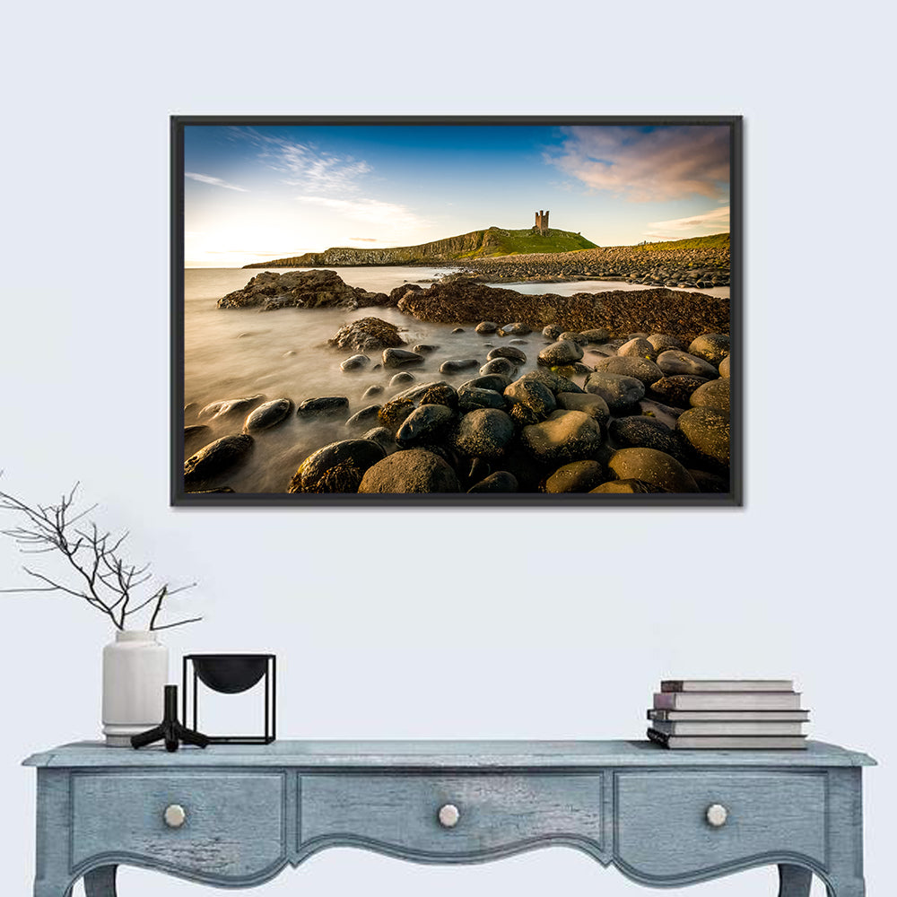 Dunstanburgh Castle at Golden Hour Wall Art in a room, landscape