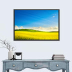 Rapeseed Field and Rolling Hills Under Blue Sky Wall Art