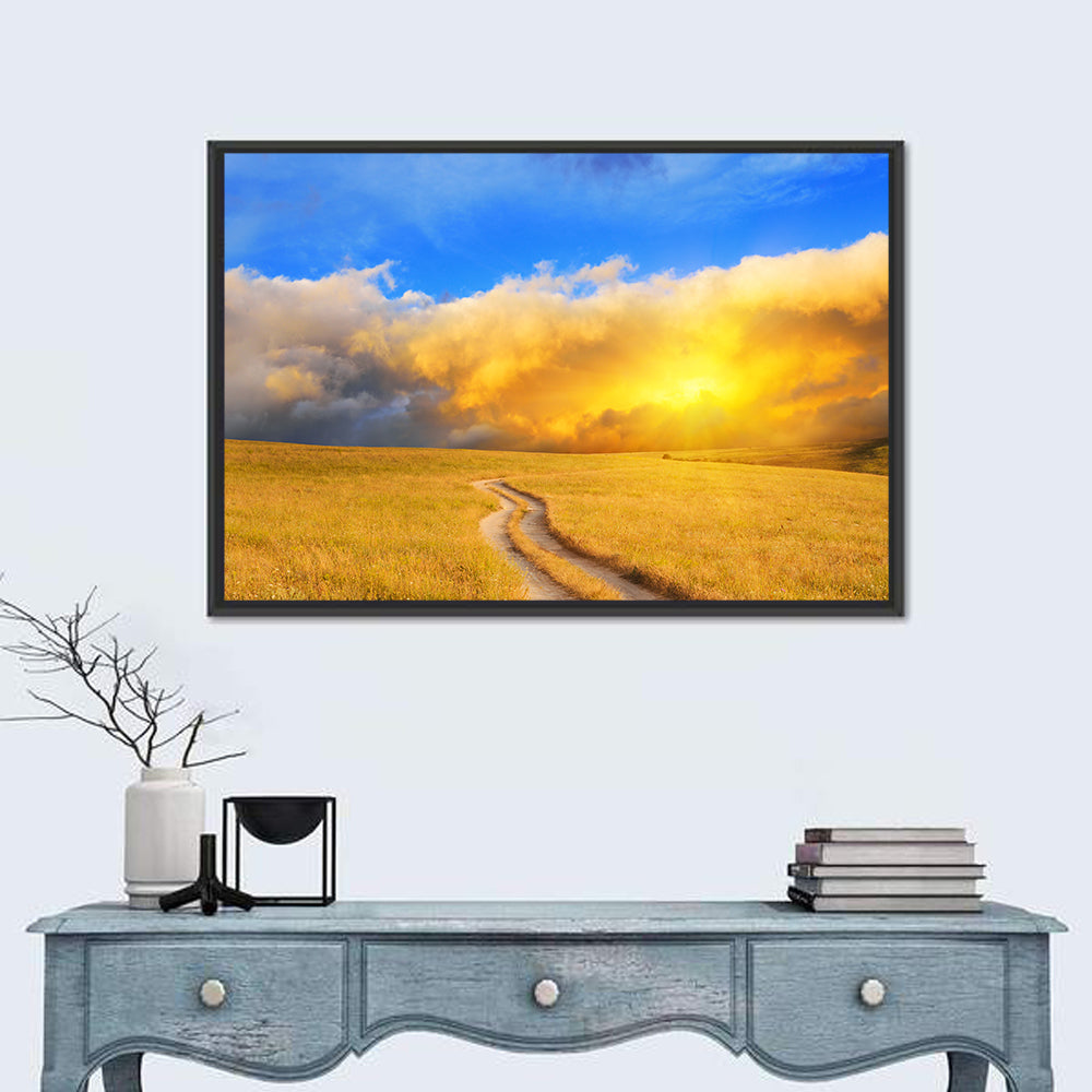 Sunlit Meadow Path with Dramatic Clouds Wall Art in a room, landscape