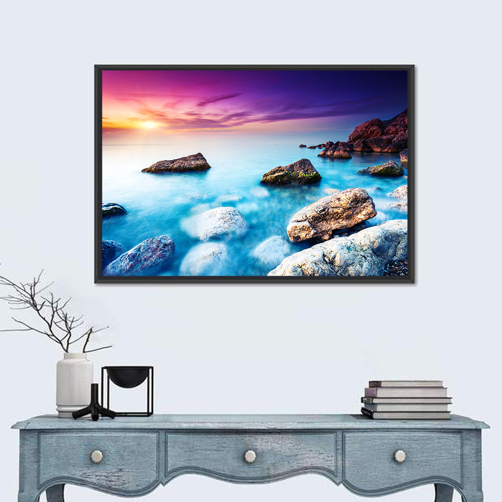 Rocky Beach Sunset Wall Art in a room, landscape