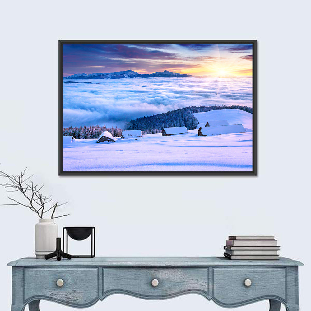 Snowy Cabins Above Clouds Wall Art in a room, landscape