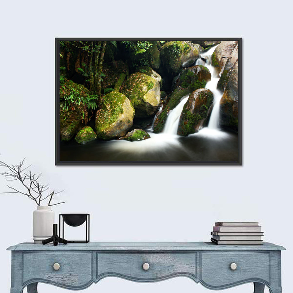 Rainforest Waterfall with Moss Covered Boulders Wall Art in a room, landscape