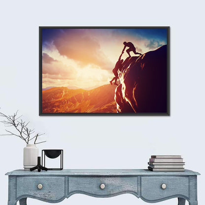 Two Hikers Summit Assist at Sunset Wall Art