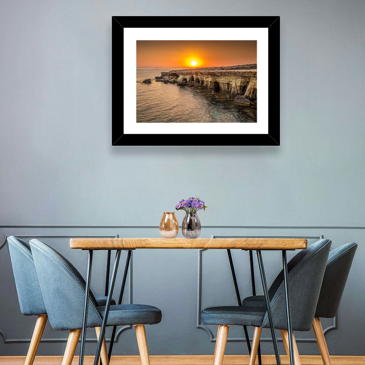 Sunset Over Sea Caves Wall Art in a room, landscape