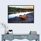 Orange Kayak on Rocky Shore Wall Art