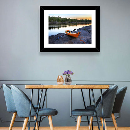 Orange Kayak on Rocky Shore Wall Art