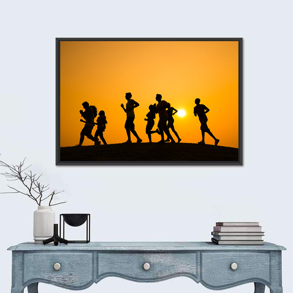 Six Runners Silhouette at Golden Sunset Wall Art in a room, landscape