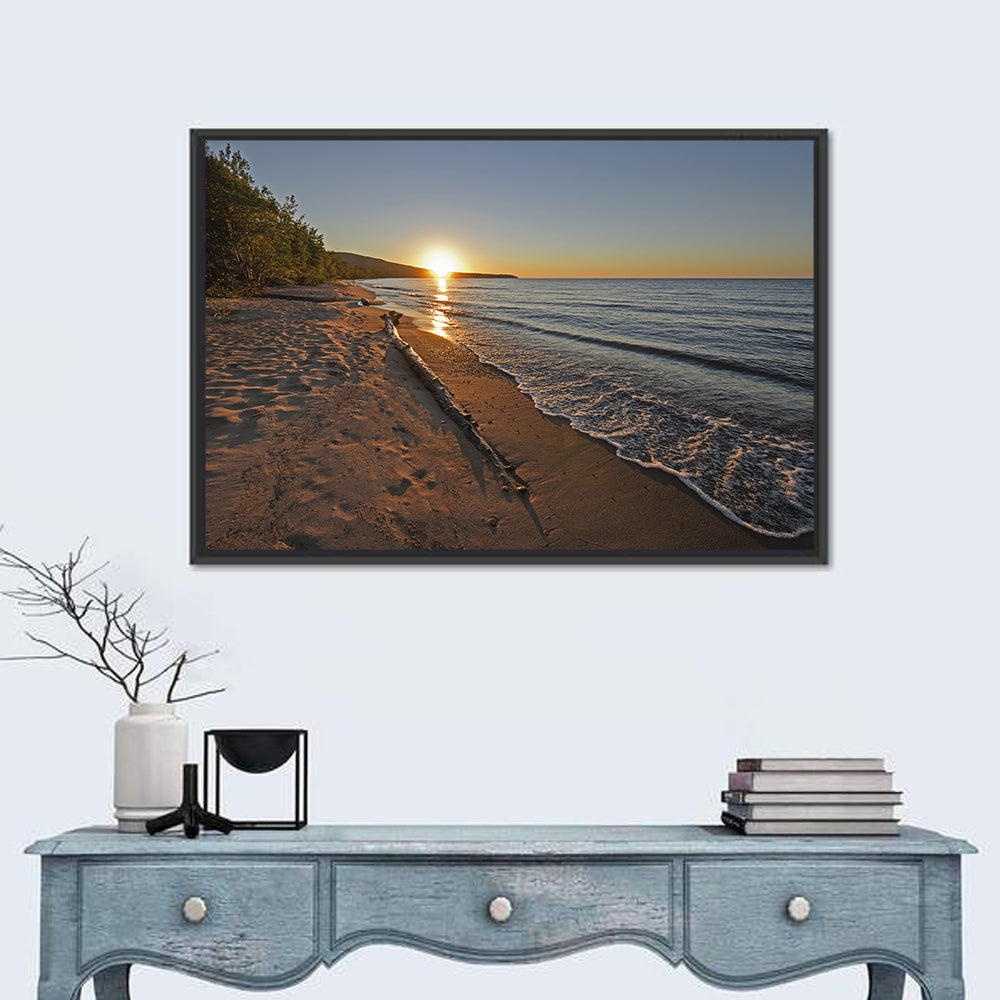 Lake Superior Driftwood Beach Sunset Wall Art in a room, landscape