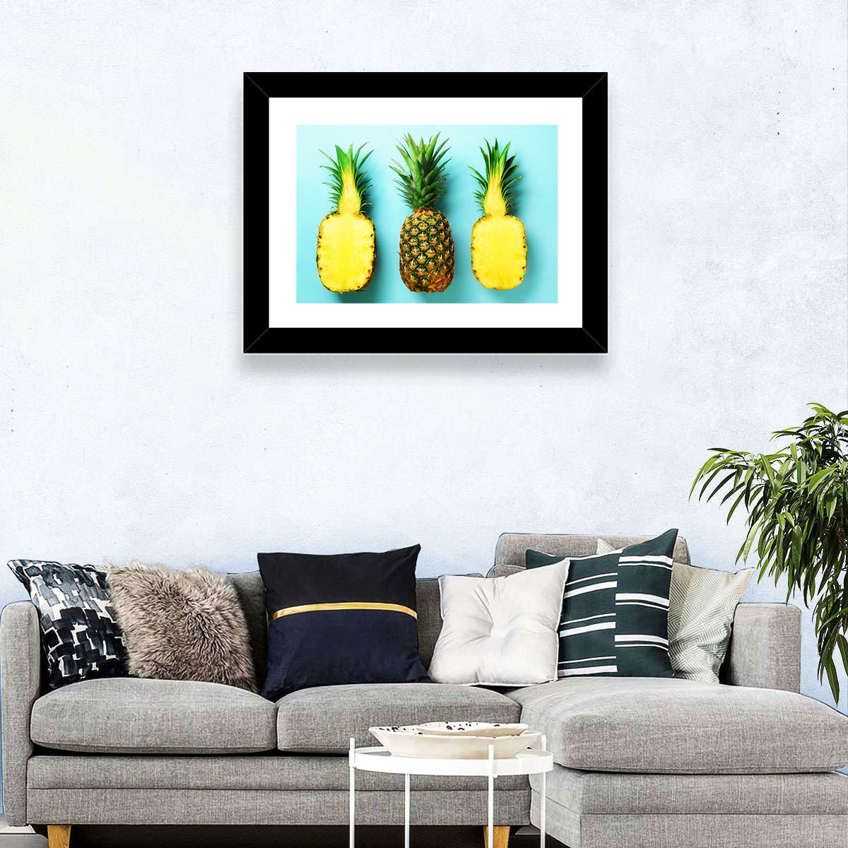 Three Pineapples Minimalist Design Wall Art in a room, landscape