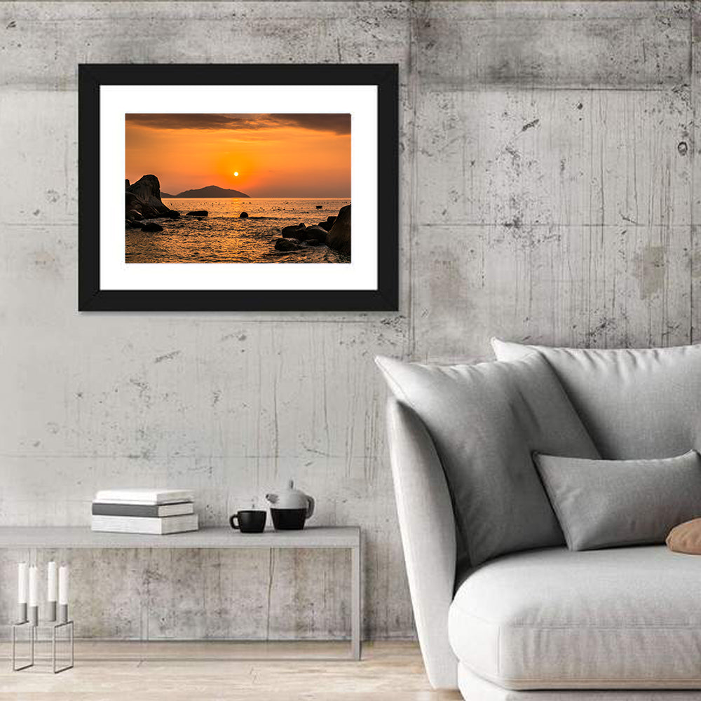 Orange Sunrise Over Rocky Coast Wall Art