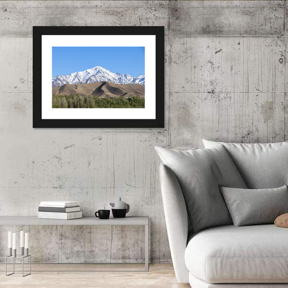 Afghan Snow-capped Peaks Above Forested Foothills Wall Art in a room, landscape