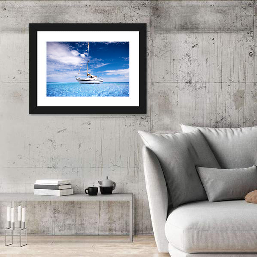 Furled Sails Over Turquoise Water Wall Art in a room, landscape