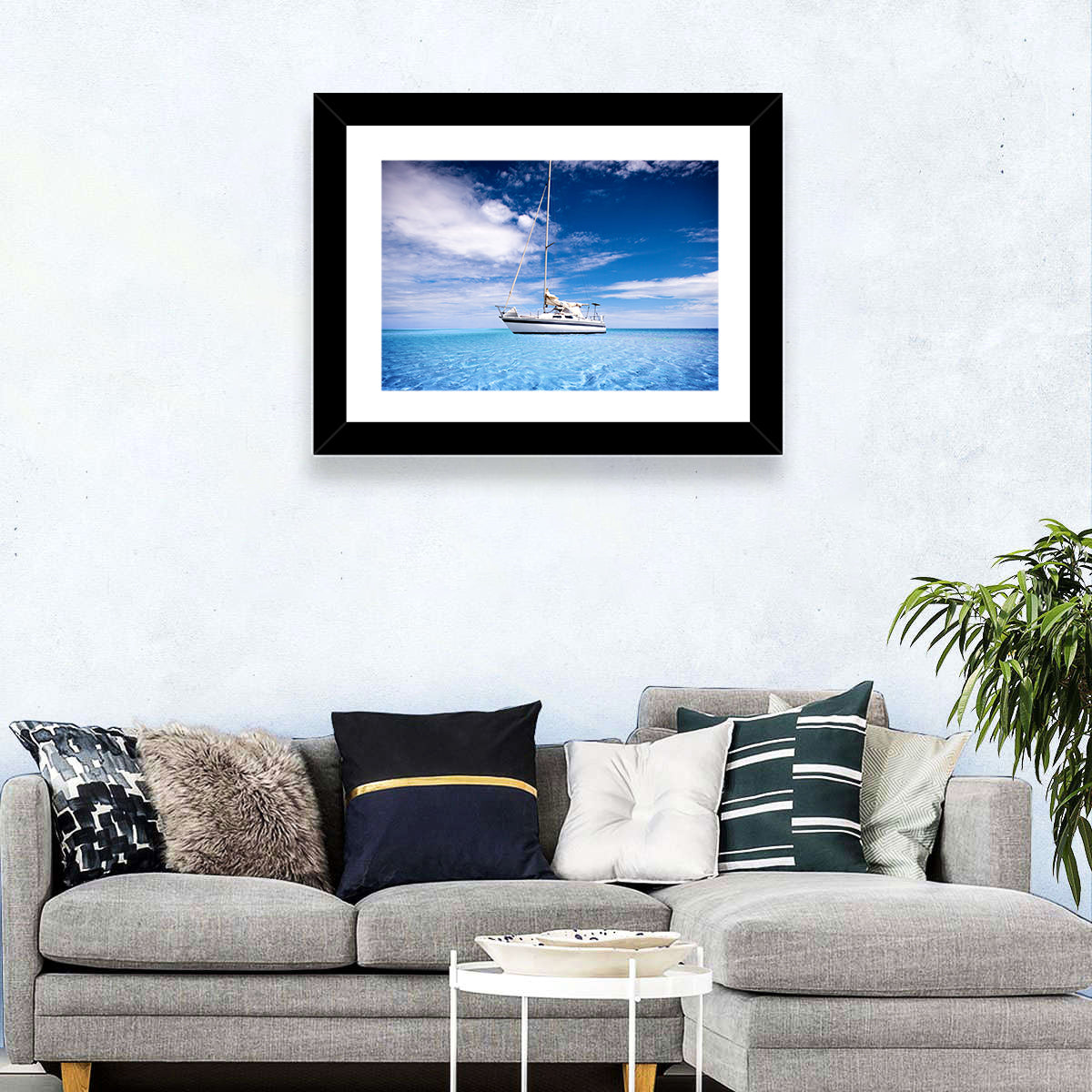 Furled Sails Over Turquoise Water Wall Art in a room, landscape