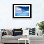 Furled Sails Over Turquoise Water Wall Art