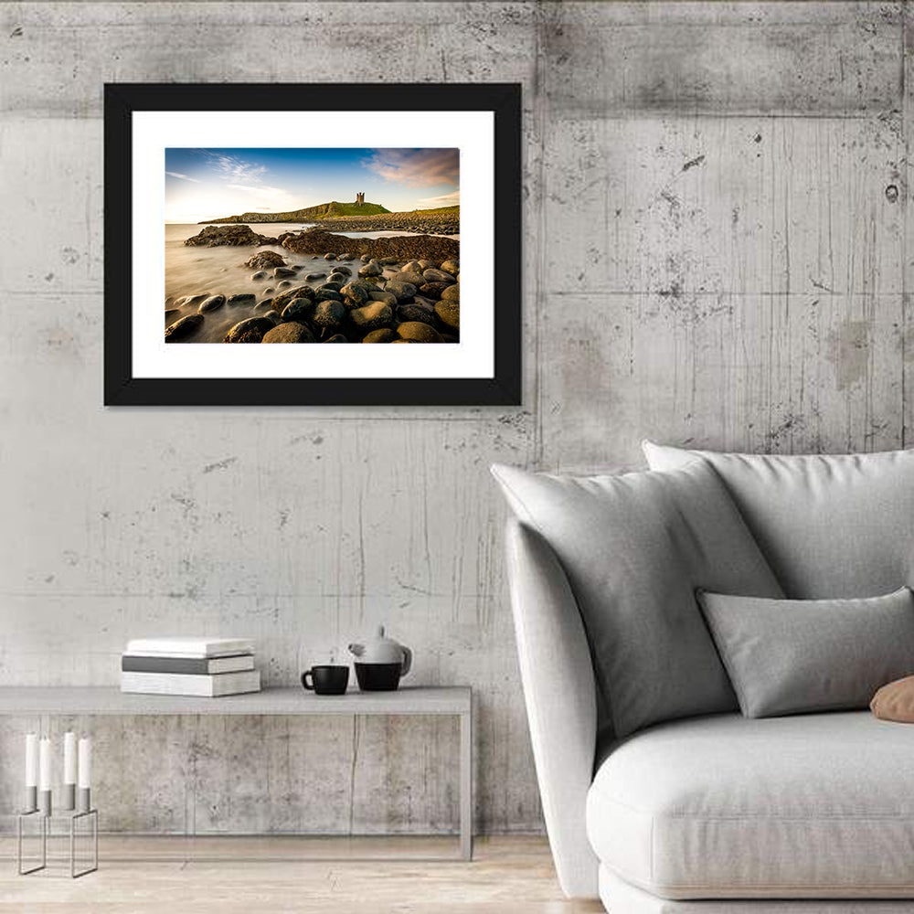 Dunstanburgh Castle at Golden Hour Wall Art in a room, landscape