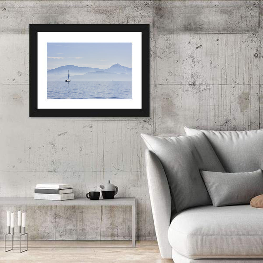 Sailboat and Misty Mountains Wall Art in a room, landscape