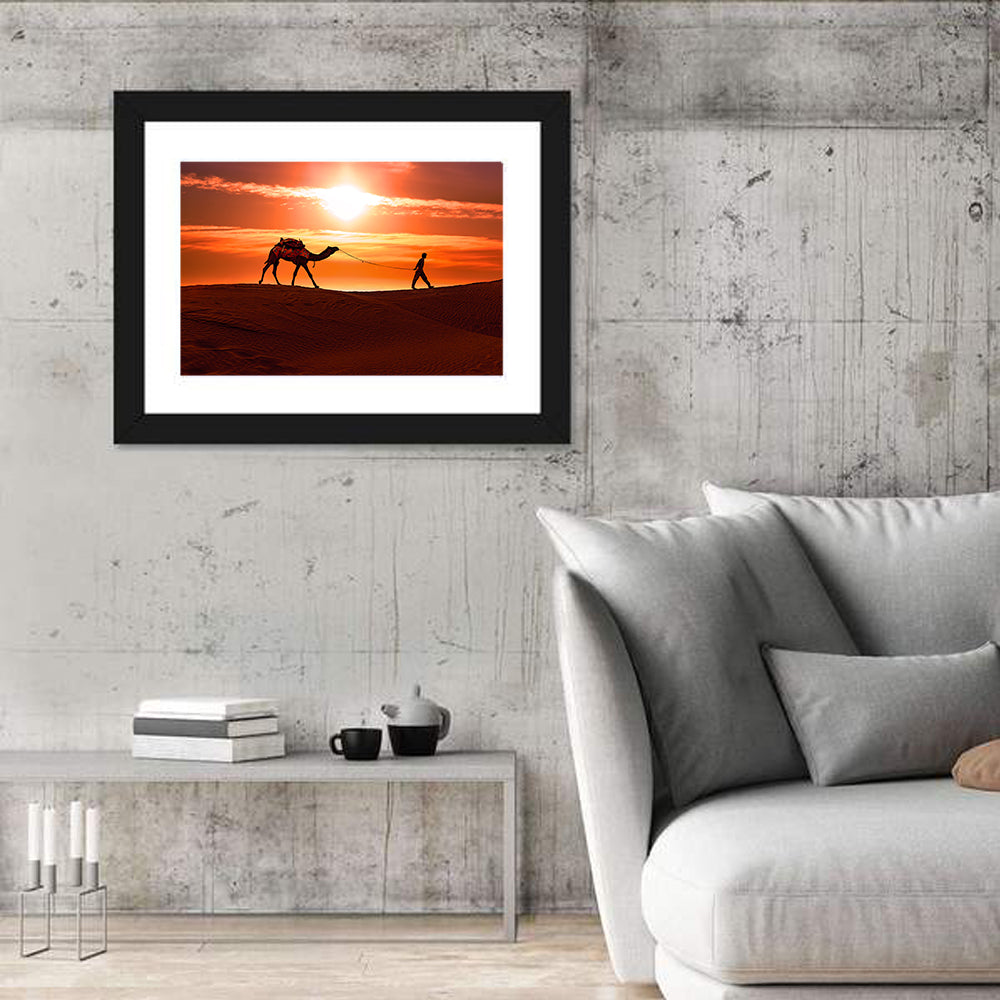 Man Leading Camel at Dusk Wall Art in a room, landscape