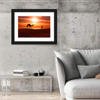 Man Leading Camel at Dusk Wall Art