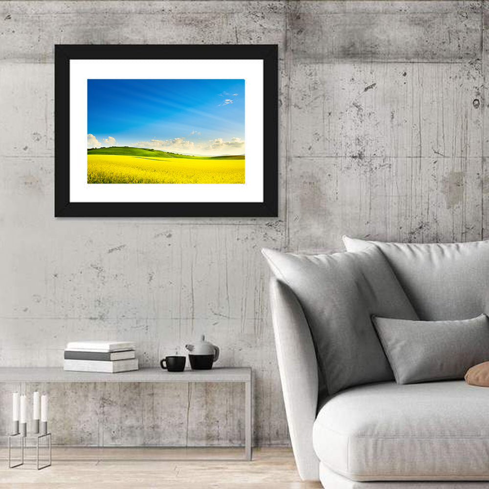 Rapeseed Field and Rolling Hills Under Blue Sky Wall Art