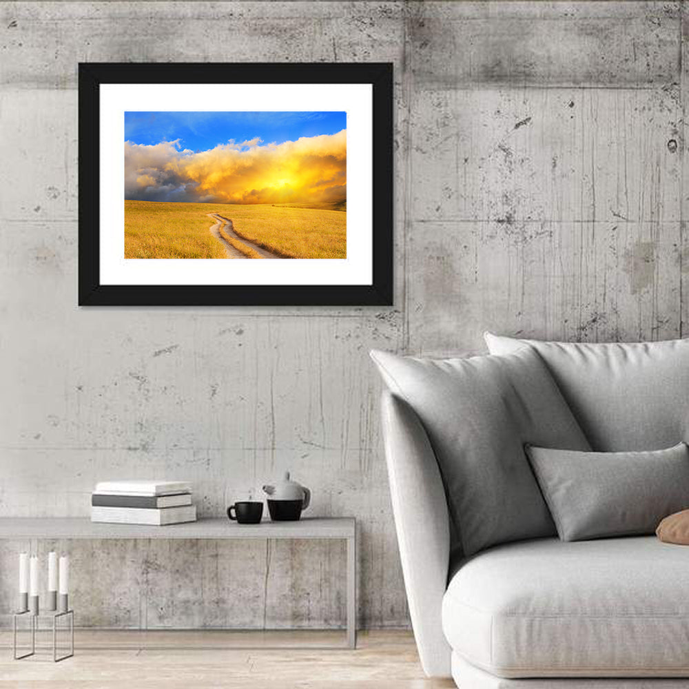 Sunlit Meadow Path with Dramatic Clouds Wall Art