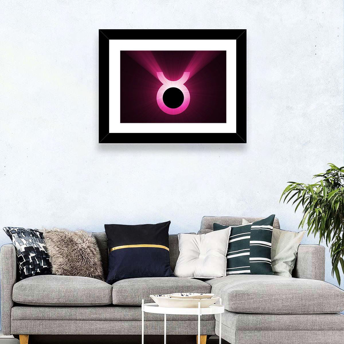 Glowing Pink Taurus Symbol Wall Art in a room, landscape